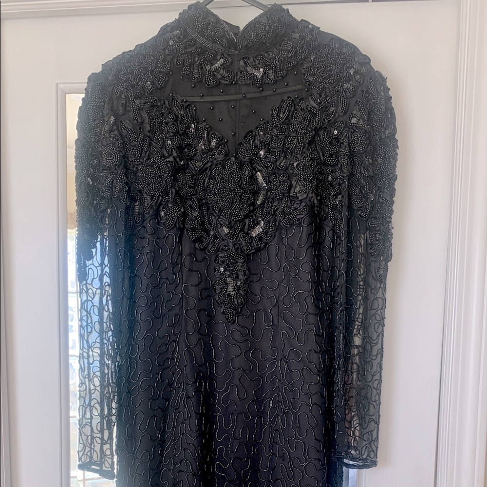 Ladies elegant and formal full length black maxi beaded dress